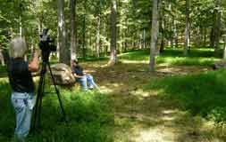 Mr. Johnson being filmed to preserve the history of the cemetery.
