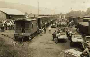 trucks and wagons unloading at Romney Depot